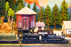 The narrow-gauge Elk Canyon & Western modular layout earned the Cowcatcher's Gold Rail Achievement Award for "it's contribution to the introduction of model railroading through a compact design with museum-like presentation."